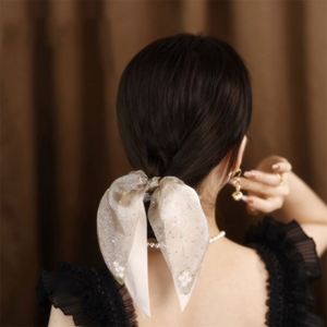 Élégant Bandeau pour Enfants de Luxe, Grand Nœud en Ruban Perlé, Anneau à Cheveux 5cm en Maille, Accessoires Capillaires en Caoutchouc de Haute Qualité - Product Image 2