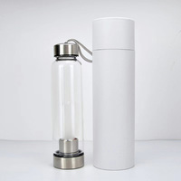 Logo personnalisé en gros de bouteille d'eau potable en verre énergie naturelle de quartz cristal clair pour cadeau
