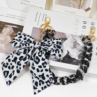 Chaîne de sac pour femme en gros, accessoire de mode avec pendentif nœud en acrylique