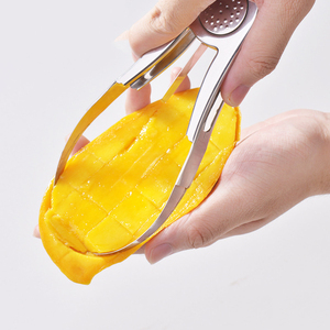 Separador de pelado de <span class=keywords><strong>Mango</strong></span> 2 en 1, pelador de acero inoxidable para excavación de papaya, Manual rebanador de <span class=keywords><strong>Mango</strong></span>, cortador de cubos de frutas, accesorios de cocina - Product Image 1