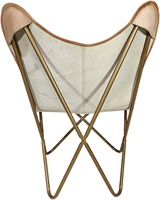 Fauteuil papillon de luxe en cuir véritable avec structure robuste et assise moelleuse pour une expérience de détente optimale dans le salon ou la chambre.