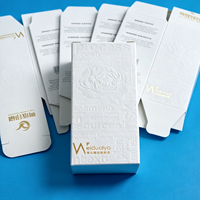 Boîte d'emballage personnalisée pour soins de la peau en carton blanc gaufré avec impression et dorure à chaud