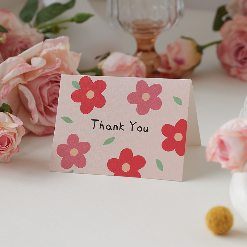Merci (fleur rouge)
