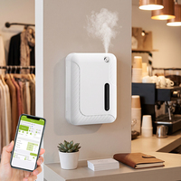 Diffuseur d'arôme électrique d'huile essentielle de parfum d'air d'hôtel de maison de machine d'air de nouveau design avec le contrôle intelligent d'application