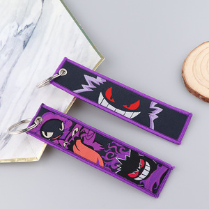 26 thiết kế mới Chất lượng cao Keyring Pika pokemonster thêu <span class=keywords><strong>tag</strong></span> Keychain cho ba lô trang trí - Product Image 5