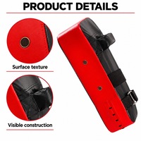 Pad de frappe de boxe portable en PU rouge avec poignée et sangles de bras réglables pour l'entraînement