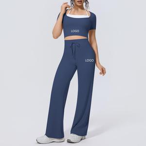 Ensemble de yoga pour femme ODM/OEM, nouveau coloris assorti, respirant, léger, avec logo frontal, deux shorts amples - Product Image 1