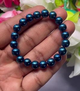Bracelet en hématite bleue de qualité supérieure : perles rondes en pierres précieuses, bracelet extensible unisexe, style classique, cadeau d'anniversaire certifié - Product Image 1
