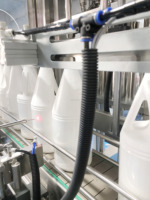 Ligne de production complète automatique de remplissage, de bouchage et d'étiquetage de shampooings et de boissons de haute précision avec moteur
