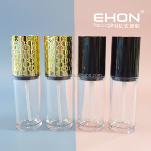 Flacon cosmétique en plastique EHON, cylindre en PET transparent avec bouchon doré gaufré et joint à brosse pour le maquillage - Product Image 1