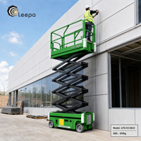 Plateforme élévatrice à ciseaux automotrice tout-terrain avec barre de sécurité de freinage automatique et protection anti-trous pour les visites d'inspection des installations
