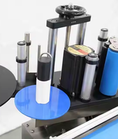 Étiqueteuse semi-automatique manuelle de bureau d'autocollant de 10ml de petite bouteille ronde de flacon en verre d'étiquette adhésive