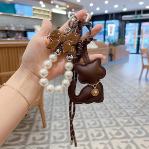 Porte-clés en cuir PU 3D mignons et kawaii, animaux 3D et pompons, accessoires pour clés de voiture avec breloques pour sacs à main - Product Image 4