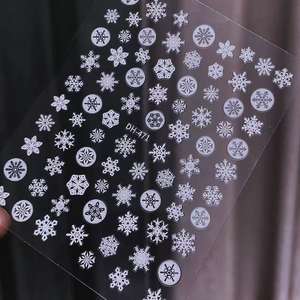 Pure Desire Christmas 3D Snowflake Nail Stickers-Diseños de nieve en relieve blanco con respaldo para accesorios de manicura DIY de lujo - Product Image 3