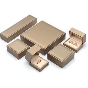 Luxury Gold PU Jewelry Box Leather Texture Gloss with Suede Lined Custom Logo Gift/Retail Packaging - Product Image 1