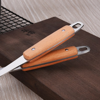 Ensemble d'ustensiles de cuisine en acier inoxydable avec manche en bois : louche à soupe, cuillère ajourée et spatule pour la maison et le wok