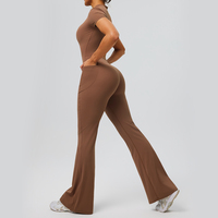 Combinaison de sport décontractée pour femme, demi-zip, manches courtes, pour la gym, avec contrôle du ventre et poches latérales, une pièce