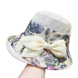 หมวกทรงบักเก็ตประดับโบว์ลายดอกไม้สำหรับผู้หญิง หมวกปีกกว้างกันแดดสไตล์เกาหลี พับเก็บได้ ทำจากผ้าฝ้ายและผ้าลินิน - Product Image 5