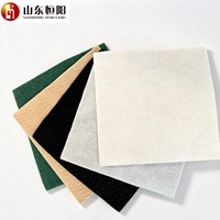 Géotextiles non tissés aiguilletés à fibres courtes de 100G-1200G utilisés pour la construction routière et la séparation des sols.