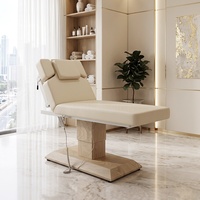 Table de massage électrique chauffante personnalisable en acier inoxydable pour salon de beauté et spa facial