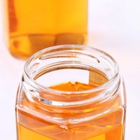 Hexagon Tebal Makanan Penyimpanan Botol Berbagai Ukuran Kaca Guci Madu dengan Disegel Logam Tutup