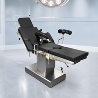Table d'opération électrique à trois fonctions avec surface radiolucente, hauteur 650-950 mm, 180 kg