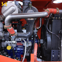 Chariot élévateur diesel de 7 tonnes avec transmission 4x4 et pneus pneumatiques, pince de manutention de fûts et barils pour la logistique chimique, utilisation en extérieur et au port