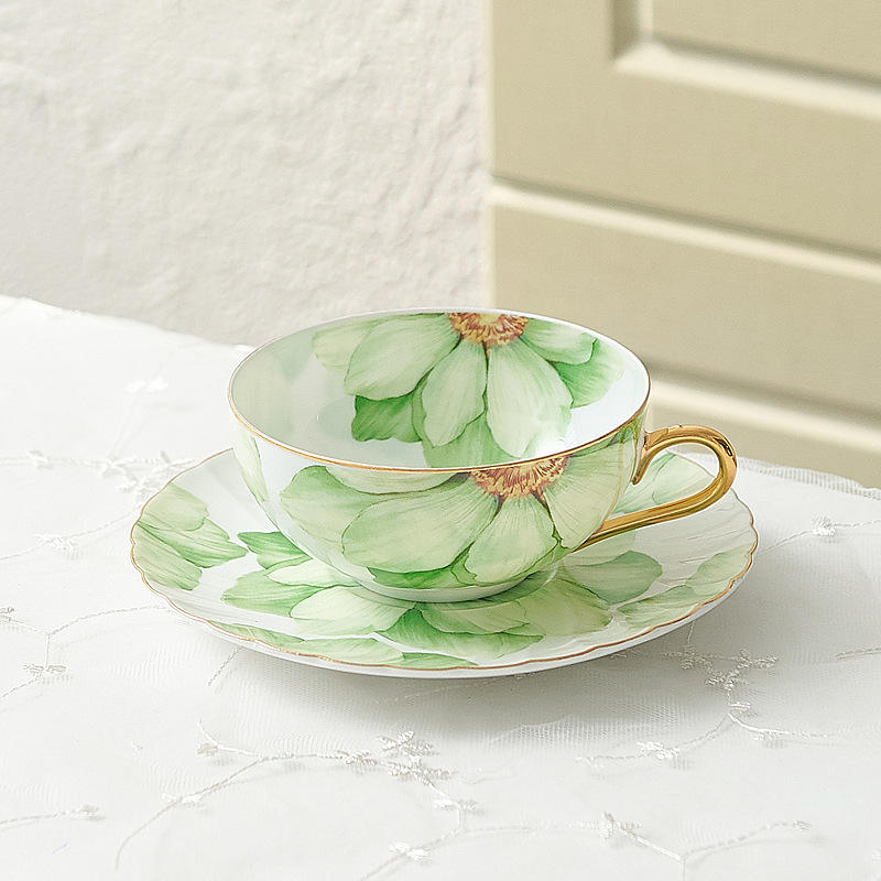 The lotus flower E cup and plate is green