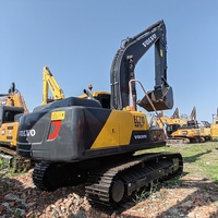 Excavatrice Volvo EC210 d'occasion, d'origine, de bonne qualité, peinture d'origine, faible consommation de carburant, avec godet de terrassement, provenant directement de l'usine.