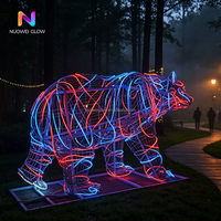 Sculpture lumineuse 3D en fer NUOWEI GLOW en forme d'ours polaire pour des scènes nocturnes époustouflantes, zoos, jardins botaniques, parcs à thème. pour la décoration