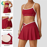 Conjunto Deportivo de 4 Piezas con Bloques de Color: Falda de Tenis de Cintura Cruzada con Pantalones Cortos, Sujetador Deportivo Halter de Alto Soporte con Bolsillos para Gimnasio y Golf
