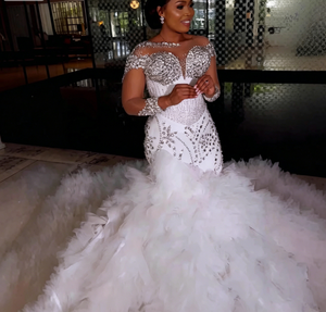 swarovski crystal beads wedding dress A handmade gown with Swarovski crystals shining like the stars and an overskirt spreading tears of love #SadekMajed #SadekMajedBridal