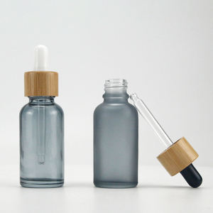 20ml 30ml 50ml 100ml vetro rotondo nero opaco diverse dimensioni <span class=keywords><strong>di</strong></span> flacone <span class=keywords><strong>di</strong></span> olio essenziale <span class=keywords><strong>di</strong></span> <span class=keywords><strong>profumo</strong></span> <span class=keywords><strong>di</strong></span> essenza con contagocce bambù - Product Image 1