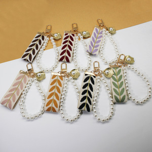<span class=keywords><strong>Porte</strong></span>-clés en tissu à motif feuille avec pendentif coquille métallique, chaîne de sac à main en perles, accessoires de breloque de sac <span class=keywords><strong>DIY</strong></span> - Product Image 1