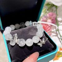 Bracelet de luxe de haute qualité pour femme, élégant, fait main, avec perles roses transparentes et accent étoile, idéal pour les soirées