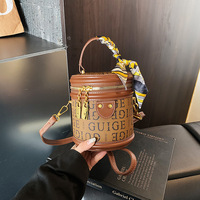 Sac bandoulière cylindrique pour femme, à sangle unique, en PU, avec fermeture éclair, motif lettres, tendance transfrontalière, été 2026, haut de gamme