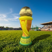 Mascotte gonflable décorative en forme de trophée avec logo pour la figurine du champion du Tournoi de football 2026