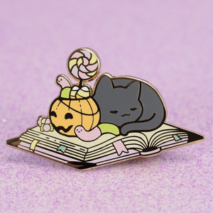 Sleepy Candy <strong>Cat</strong> Laying on <strong>the</strong> <strong>Book</strong> Enamel Lapel Pin Badge Custom Pumpkin Halloween Gifts Hard Enamel Pins <strong>cat</strong> for Holiday Gift - Product Image 1