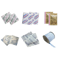 Machine de distribution et de dosage automatique de sachets d'absorbeurs d'oxygène et de désoxydants pour l'emballage de produits secs et de mélanges de noix