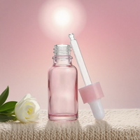 Bouteille d'huile essentielle en verre rose de fantaisie de 20ml en forme de cylindre avec compte-gouttes pour la beauté soins de la peau sérum et crème Commande minimum 500 pièces