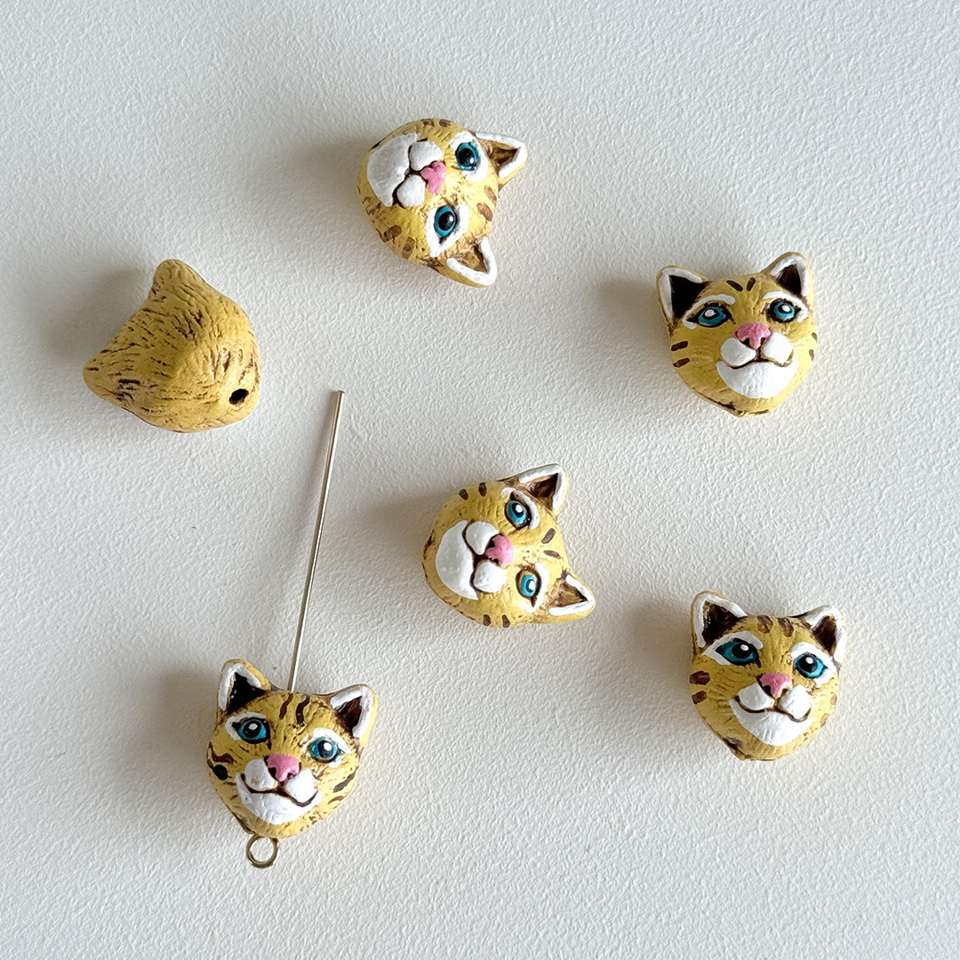 Cabeza de gato amarilla (13 mm)