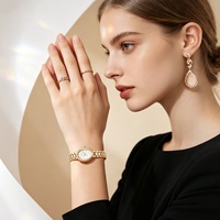 AIMANA Nouvelle montre à quartz élégante de luxe léger pour femme avec cadran en forme d'œuf de pigeon, bracelet en acrylique, résistante à l'eau 30M