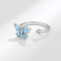 Bague ouverte anti-stress en argent sterling 925 avec zircone cubique et motif papillon rotatif