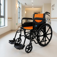Fauteuil roulant pliable manuel à cadre en acier avec frein linéaire et coussin en maille orange pour la mobilité intérieure/extérieure