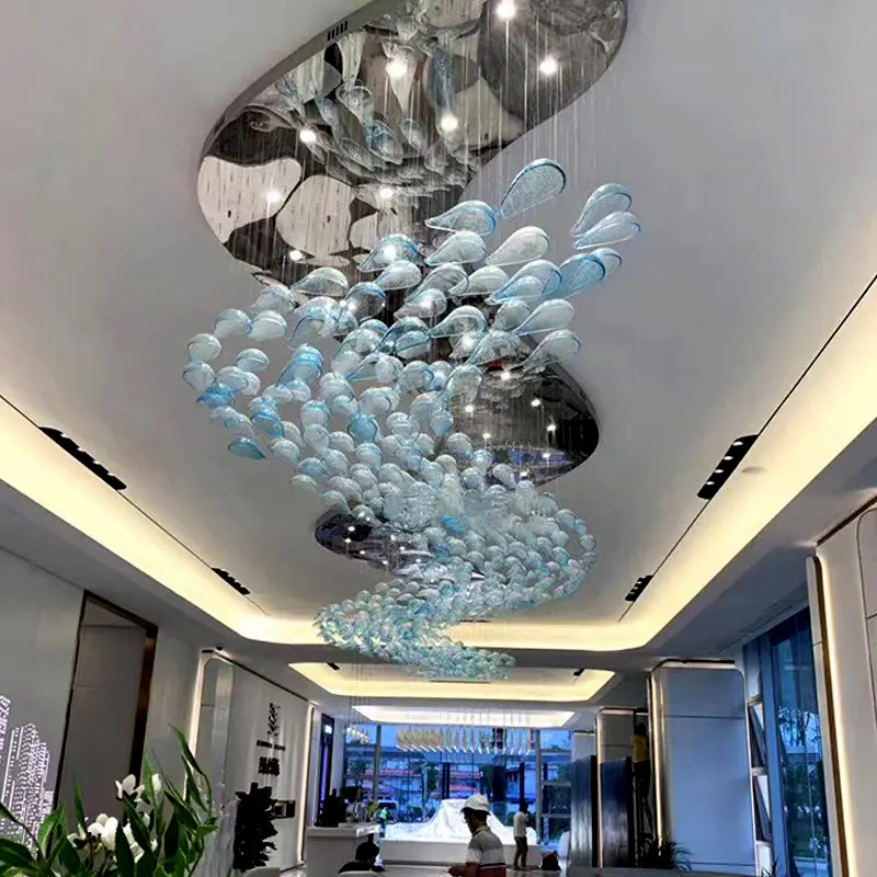 高級ヴィラホテルペンダントライトロビークラブのリビングルーム用の高天井ランプ用の楕円形の白鳥の卵ブルーガラス大型シャンデリア