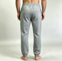 Pantalon de jogging gris sérigraphié en molleton éponge, taille élastique, coupe ajustée décontractée, jambe large, léger pour homme