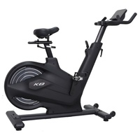 Bicicleta de Spinning Magnética K-FIT GSP2303 con Pantalla LED, Volante de Inercia de 18 kg, Transmisión por Correa Autoalimentada, Consola Bluetooth, Ciclismo Indoor