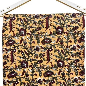 Premium mustard yellow hand block print cotton <b>fabric</b> unstitched suit material featuring traditional maroon floral vines - Product Image 1