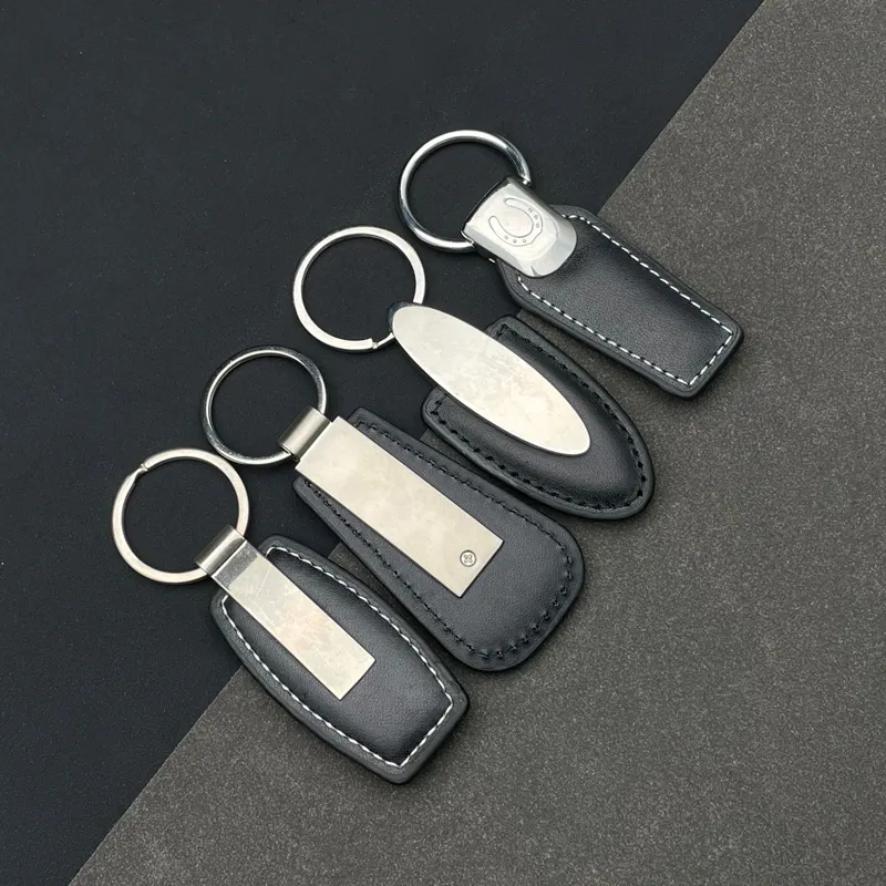 Gantungan kunci tali kulit hitam simpel mode baru gantungan kunci PU logam kosong kustom