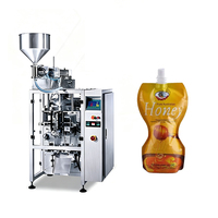 Machine d'emballage verticale entièrement automatique à piston doseur pour sauces, pâtes et condiments visqueux, avec formage, remplissage et scellage de sachets